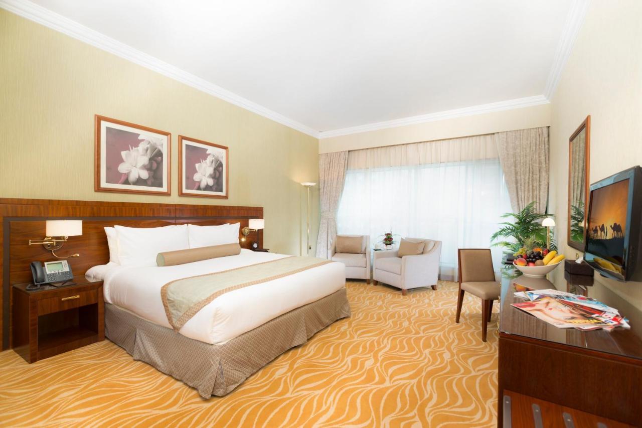 Grand Mercure Majlis Residences Abu Zabi Zewnętrze zdjęcie A room at the hotel
