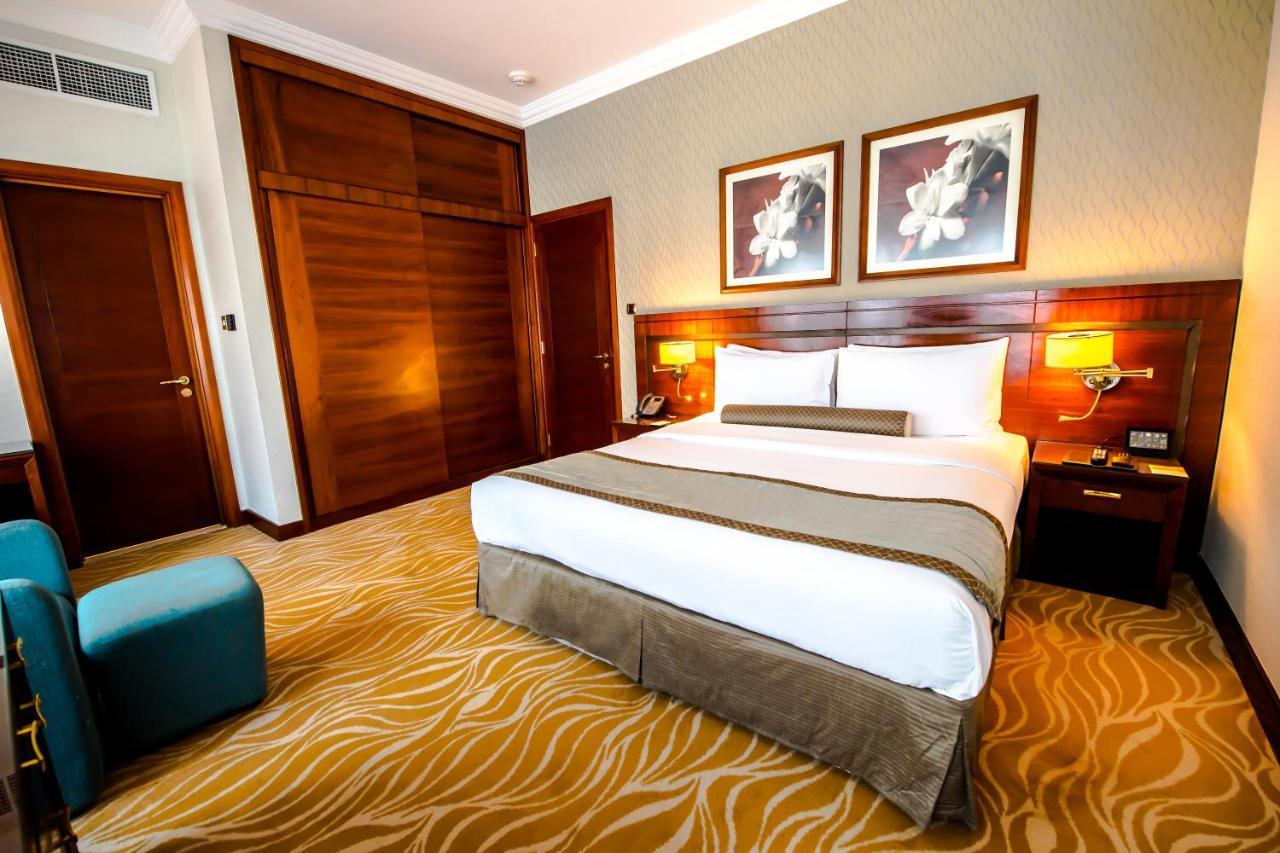 Grand Mercure Majlis Residences Abu Zabi Zewnętrze zdjęcie A bedroom at the hotel