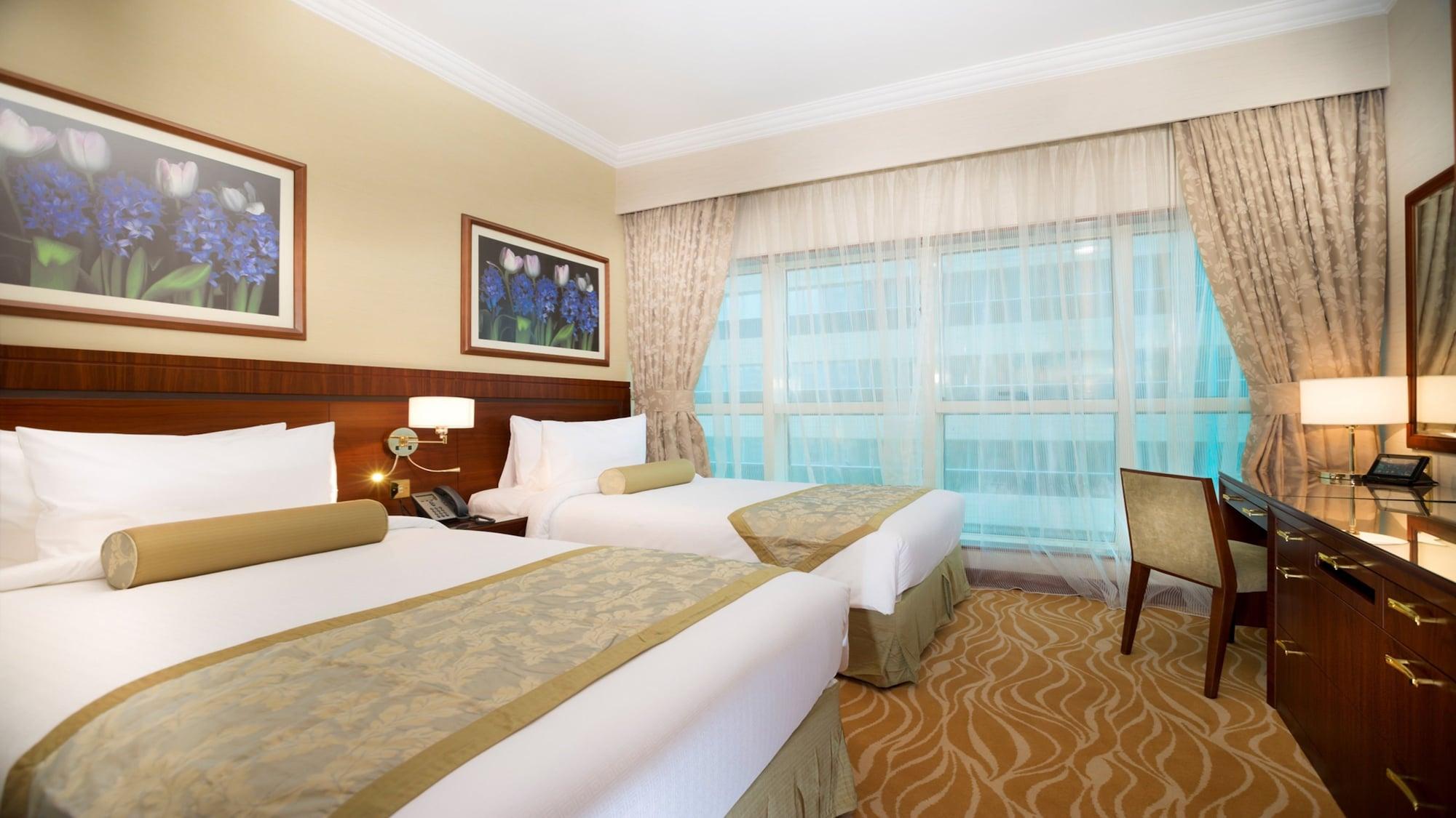 Grand Mercure Majlis Residences Abu Zabi Zewnętrze zdjęcie A room at the hotel