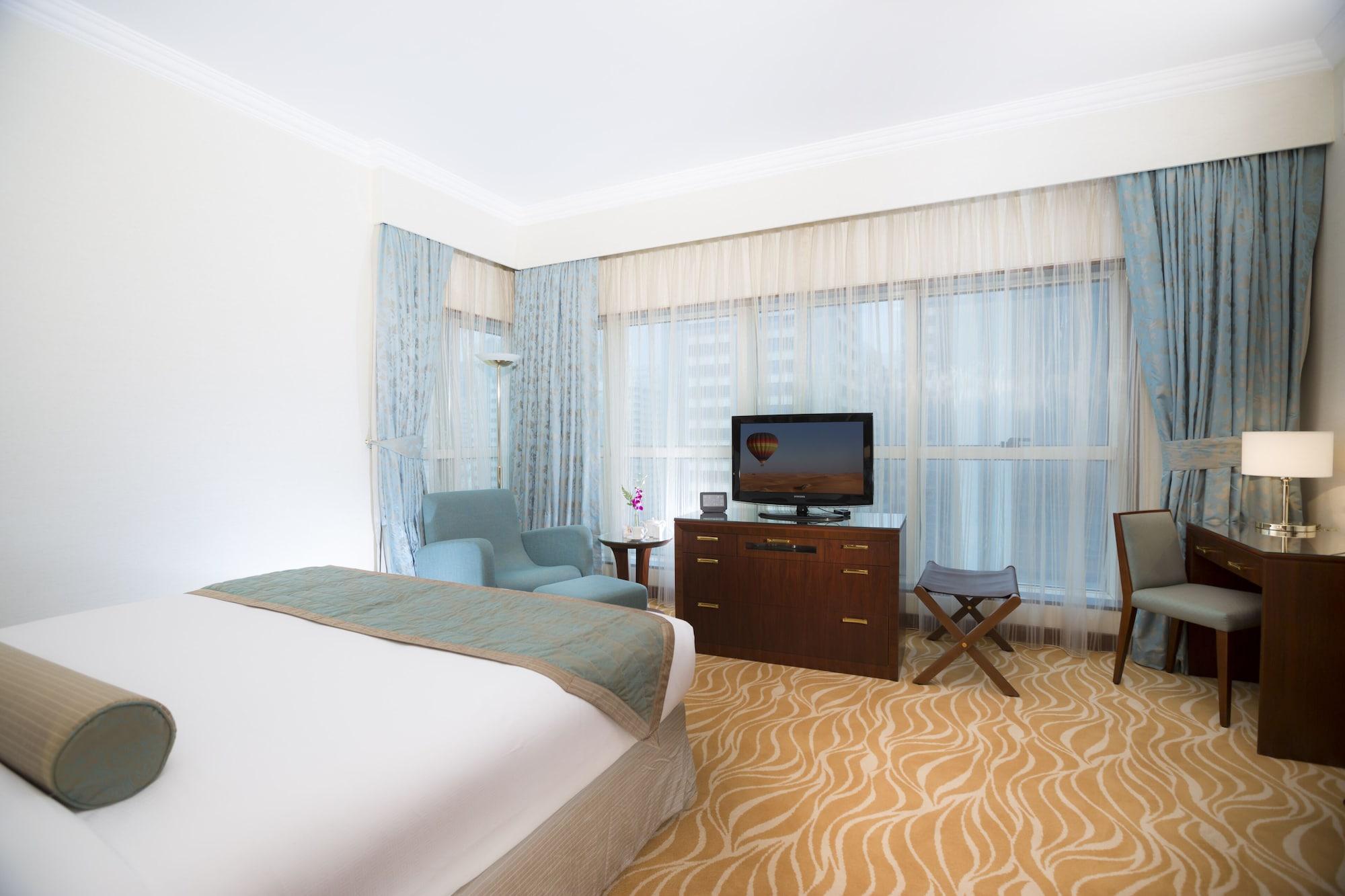 Grand Mercure Majlis Residences Abu Zabi Zewnętrze zdjęcie A room at the hotel