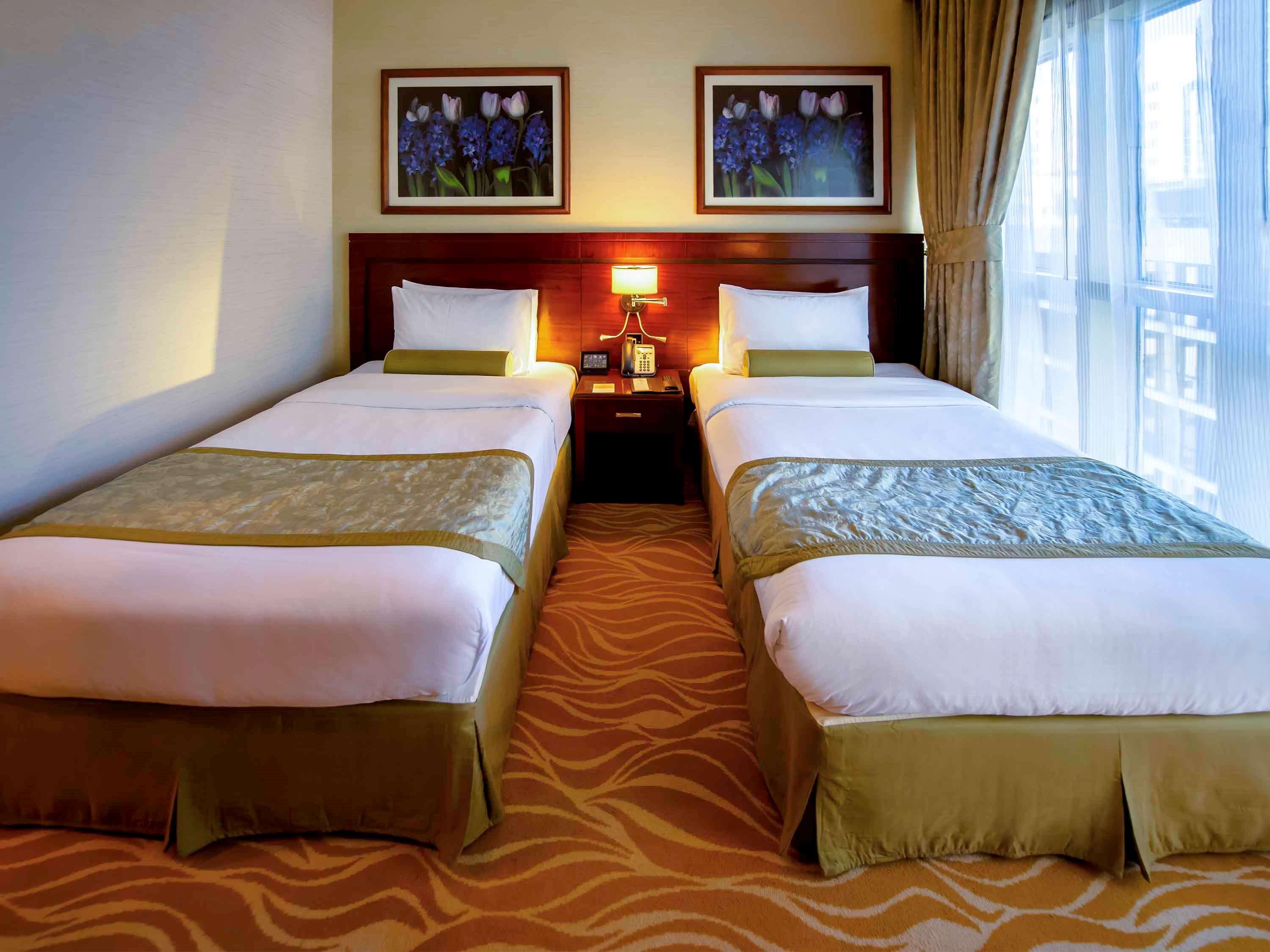 Grand Mercure Majlis Residences Abu Zabi Zewnętrze zdjęcie A room at the hotel