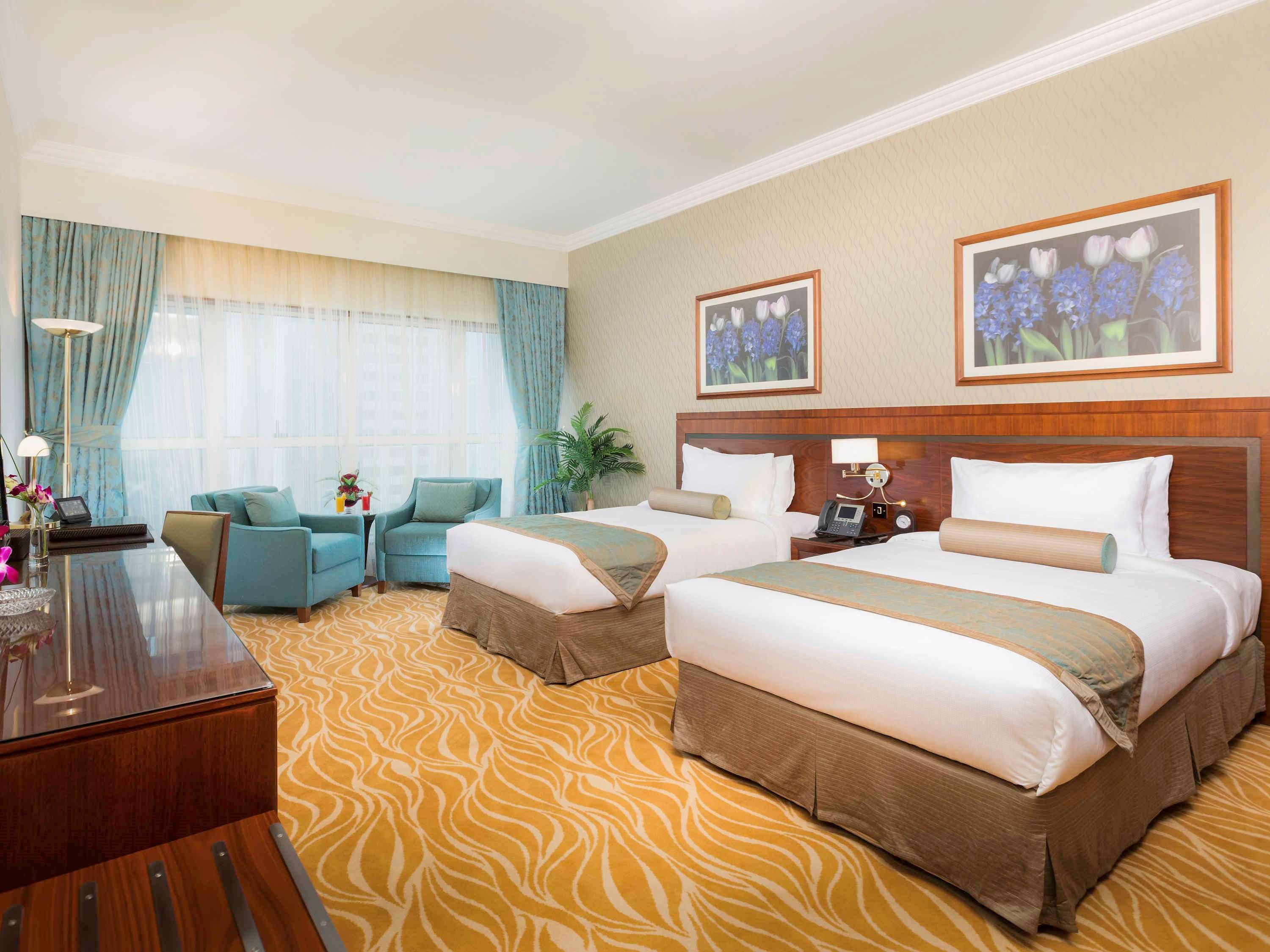 Grand Mercure Majlis Residences Abu Zabi Zewnętrze zdjęcie A room at the hotel